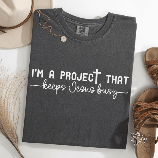 I'm a Project That Keeps Jesus Busy Graphic Tee